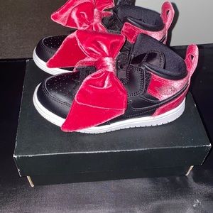 Pink bow Jordan 1s